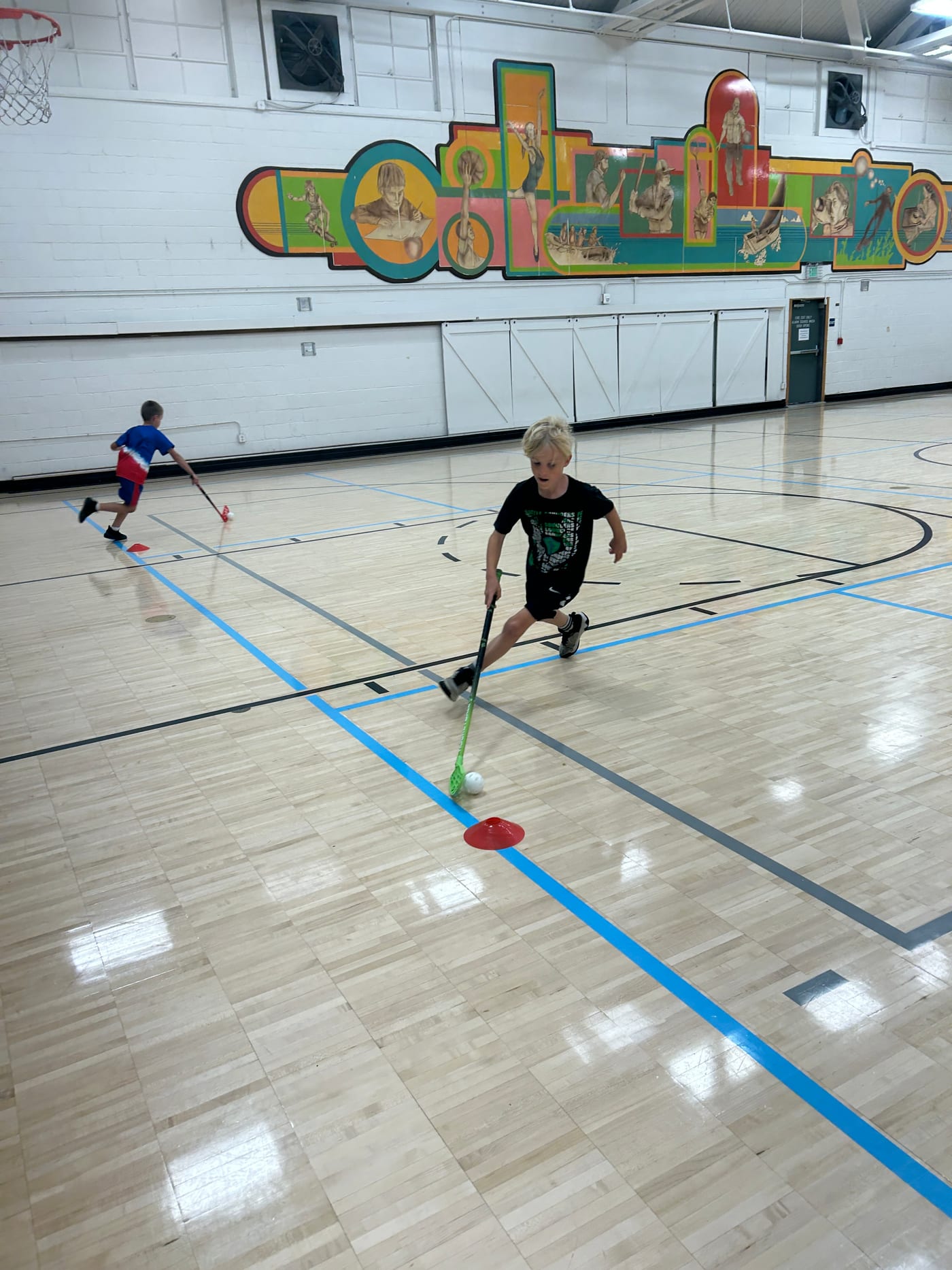 Edmonds Summer Camp ball hockey action